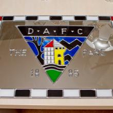 Mirror with DAFC badge